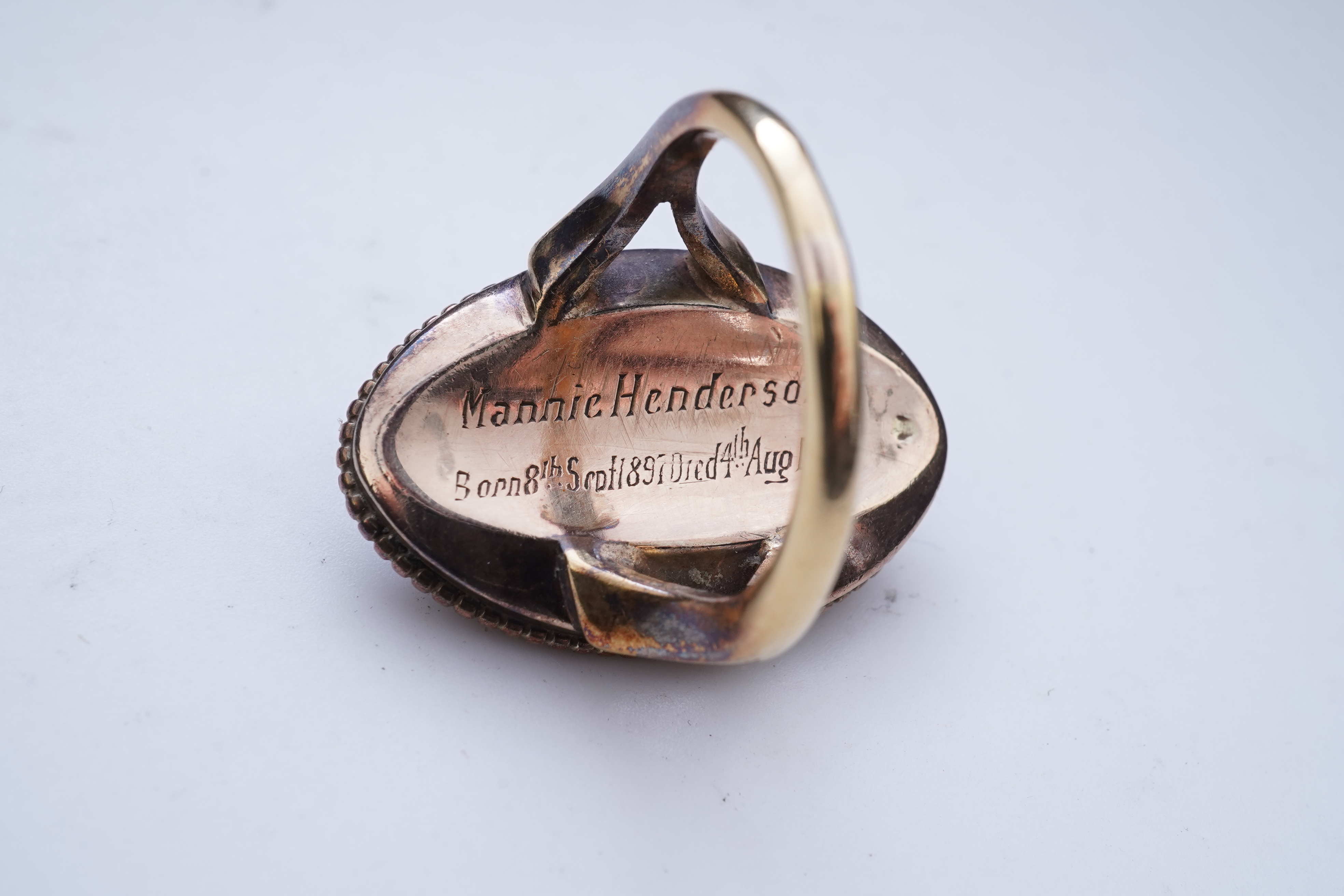 An enamel and diamond mourning ring, late 19th century